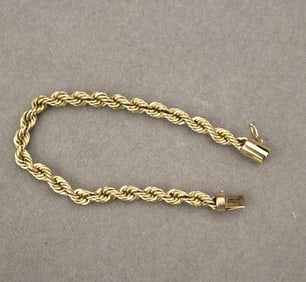 14K YELLOW GOLD FLEXIBLE ROPE CHAIN BRACELET. - L: 7 1/2 in. W: 1/4 in. Wt. 12 dwt.