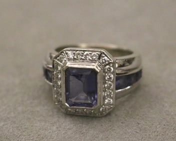 14K WHITE GOLD, DIAMOND AND TANZANITE RING.