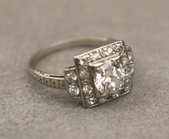 EARLY 20TH CENTURY PLATINUM AND OLD EUROPEAN CUT DIAMOND GEOMETRIC RING. - Ring size: 7 1/4.