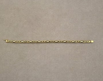 18K (750) BRIGHT-POLISHED YELLOW GOLD SQUARED BYZANTINE LINK FLEXIBLE BRACELET. - L: 8 1/2 in. W:
