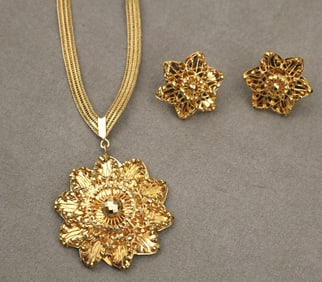 HIGH KARAT YELLOW GOLD FLORAL MEDALLION PENDANT ON FLEXIBLE STRAPWORK CHAIN WITH PAIR MATCHING