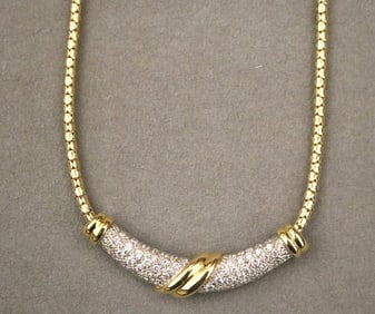 CONTEMPORARY 18K BRIGHT-POLISHED YELLOW AND WHITE GOLD AND DIAMOND FLEXIBLE-LINK CHOKER. - Gross