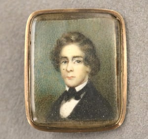 10K GOLD-FRAMED RECTANGULAR PORTRAIT MINIATURE BROOCH, early 19th century. - 1 3/8 in. x 1 1/8 in.