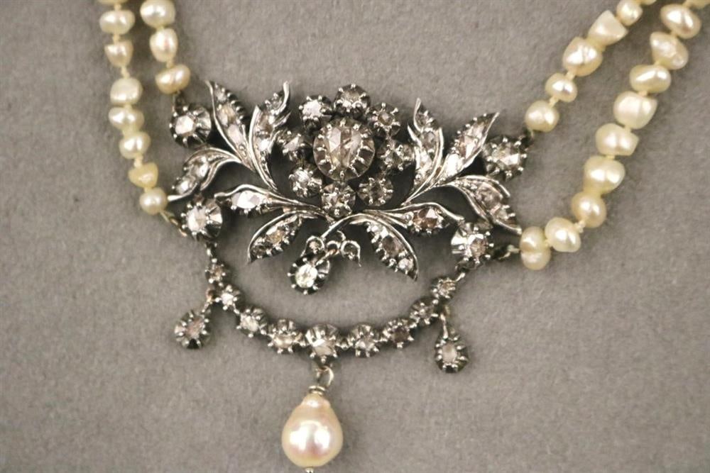 GEORGIAN SILVER, DIAMOND AND PEARL CHOKER,: GEORGIAN SILVER, DIAMOND AND PEARL CHOKER, Two strands of baroque pearls center openwork flowerhead, leaf and swag ornament set with multi-facet rose-cut, pear shape diamond surrounded by 44 smaller