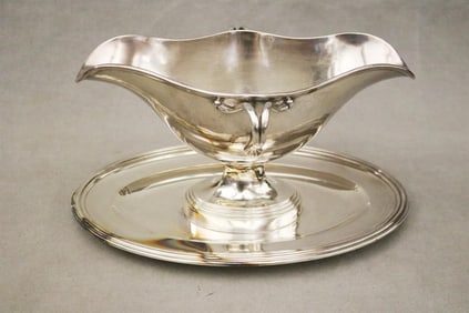 FIVE-PIECE CHRISTOFLE HEAVY SILVER-PLATED TABLEWARE, - Gravy boat, L: 10 5/8 in. Coasters, D: 6 1/8