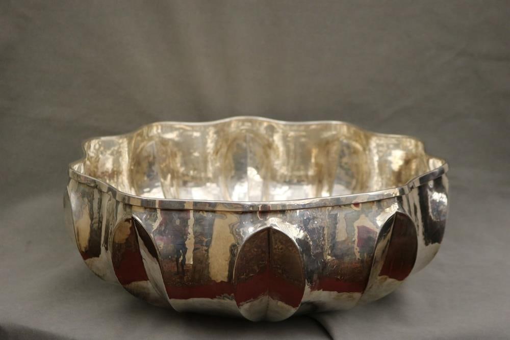 CONTEMPORARY ITALIAN SILVER-PLATED CENTER BOWL, - H: 6 in. D: 16 in.: CONTEMPORARY ITALIAN SILVER-PLATED CENTER BOWL. Shaped, with hand-hammered textured and undulating rim - H: 6 in. D: 16 in.