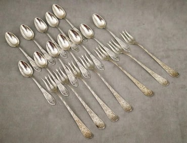SET ELEVEN EARLY 20TH CENTURY STERLING SILVER TRIDENT-FORM SEAFOOD FORKS AND SET 12 CONTINENTAL