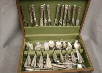 118 PIECES CLOSELY SIMILAR FLORAL REPOUSSE STERLING SILVER FLATWARE.
