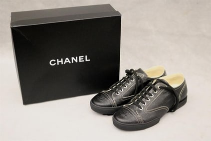 PAIR LADY'S CHANEL BLACK COATED CANVAS LACE-UP SNEAKERS, SIZE 40.