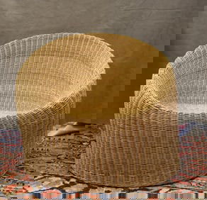 WICKER "ELEPHANT BOOT" CHAIR BY EERO AARNIO [FINNISH, B. 1932].