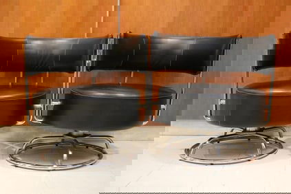 PAIR VINTAGE BLACK LEATHER UPHOLSTERED CHROME-FRAMED CIRCULAR LOW, SWIVEL BASE CHAIRS,