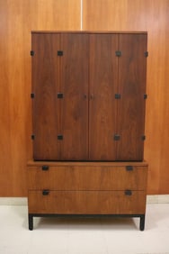 MID-CENTURY MODERN WALNUT GENTLEMEN'S CHEST / BUREAU BY MILO BAUGHMAN FOR DIRECTIONAL. In two parts.