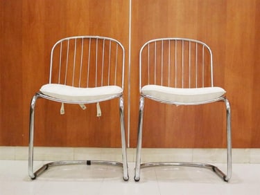 SET EIGHT GASTONE RINALDI FOR RIMA CHROMED METAL SIDE CHAIRS.