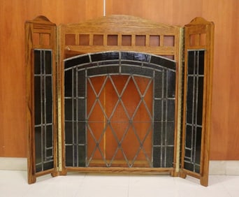 OAK-FRAMED STAINED GLASS THREE-FOLD FIREPLACE SCREEN OF ARTS & CRAFTS MOVEMENT DESIGN INFLUENCE.