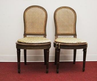 PAIR LOUIS XVI-STYLE CARVED FRUITWOOD DIMINUTIVE SIDECHAIRS WITH CANED BACKS AND BALLOON SHAPED