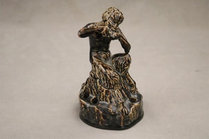 ROOKWOOD ART POTTERY SATYR FLOWER FROG. 1922. - H: 6 3/4 in.