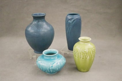 FOUR ASSORTED ROOKWOOD MONOCHROME GLAZED ART POTTERY VASES WITH RELIEF DECORATION. Blue baluster