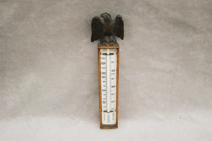 VINTAGE WOODEN RECTANGULAR WALL BAROMETER WITH CARVED EAGLE CREST, late 19th-early 20th century. -