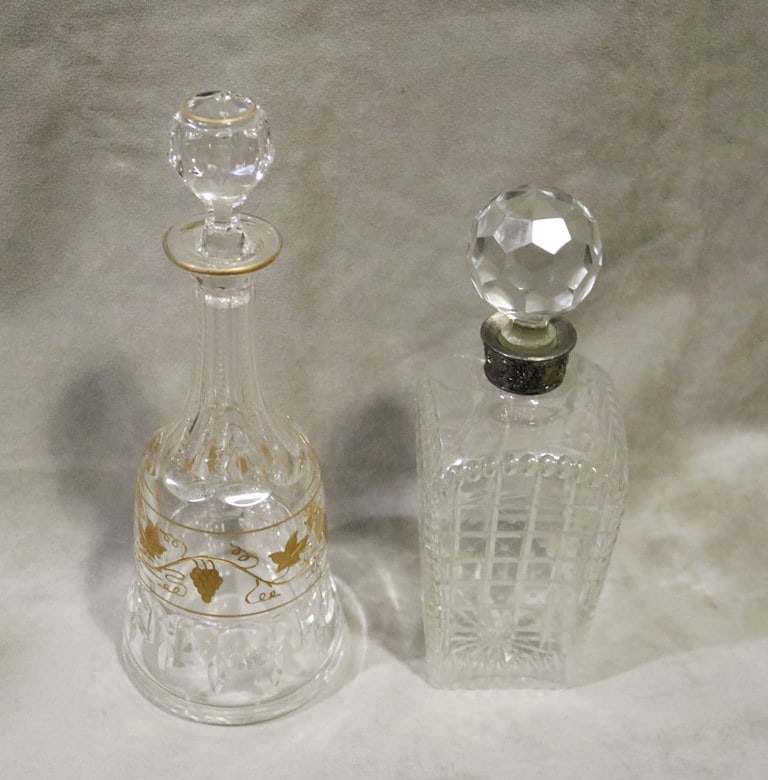 TWO VINTAGE COLORLESS CUT CRYSTAL DECANTERS WITH STOPPERS. (1 of 6)