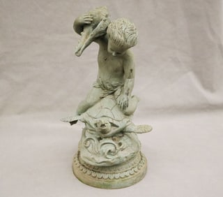 GREEN PATINATED METAL GARDEN FIGURE. - Height: 18 1/4".