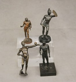 FOUR ASSORTED BRONZE MINIATURE CLASSICAL FIGURES OF MALE YOUTHS.
