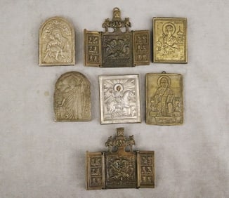 SIX ASSORTED RUSSIAN RELIEF-CAST BRASS/BRONZE/ SILVER TRAVELING ICONS AND A PAINTED MINIATURE ICON