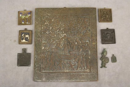 RUSSIAN BRASS BRONZE RELIEF ICON AND SEVEN ASSORTED MINIATURE ICONS AND ICON PENDANTS.