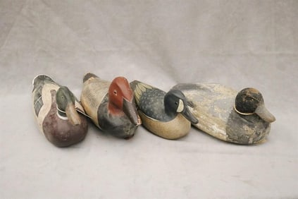 GROUP FOUR VINTAGE CARVED AND PAINTED DUCK DECOYS, - Longest, L: 13 in.