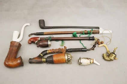 EIGHT ASSORTED GERMAN PIPES AND PIPE PARTS, late 19th-early 20th century. - Longest, L: 16 in.