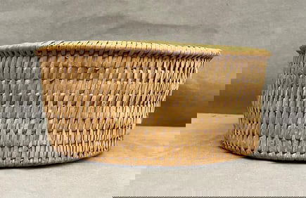 HAND WOVEN PINE NEEDLE BASKET.