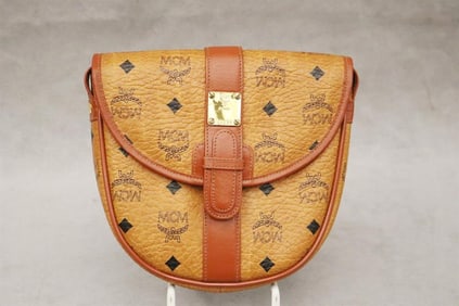 MCM MONOGRAM COGNAC COLOR VISETOS COATED CANVAS AND LEATHER POCHETTE OR CROSSBODY BAG.