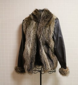 LADY'S ZIP-FRONT DARK BROWN LEATHER JACKET WITH LYNX TRIM.