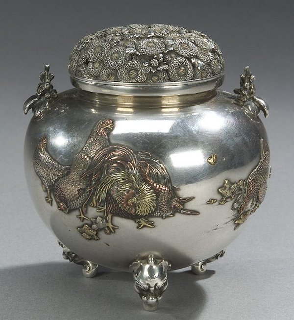A JAPANESE SILVER AND MIXED METAL TRIPOD