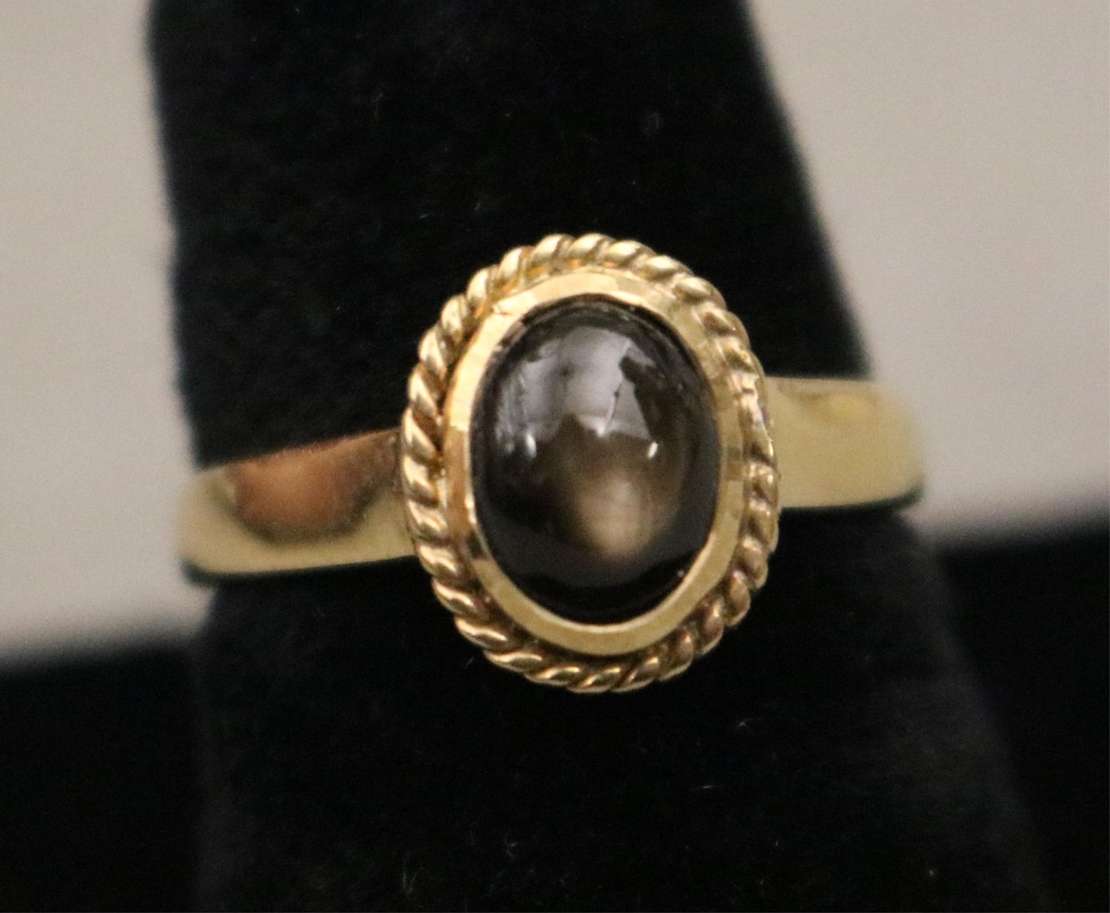 18K BRIGHT-POLISHED YELLOW GOLD AND OVAL BLACK SAPPHIRE CABOCHON RING (1 of 9)