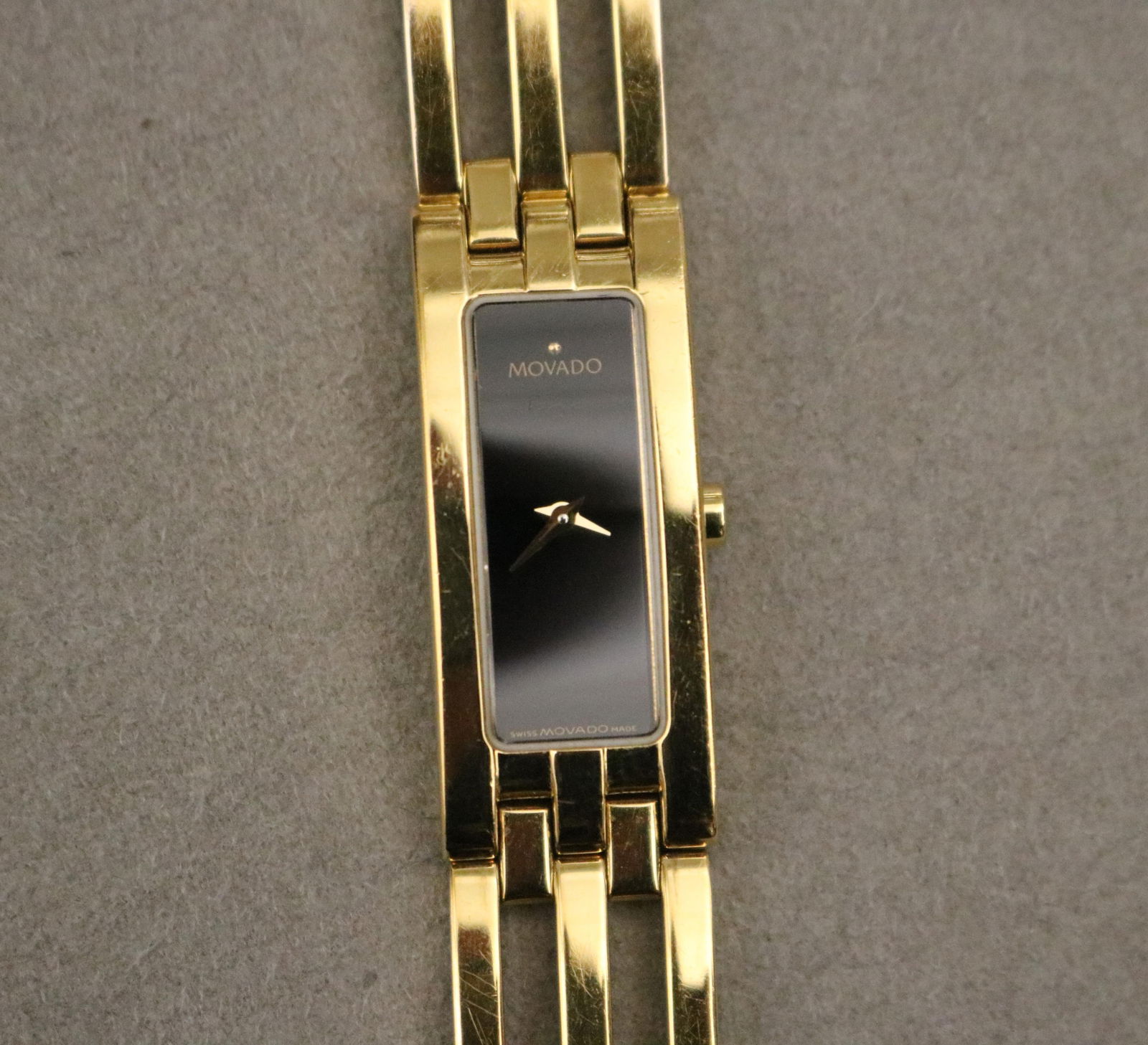 LADY'S MOVADO YELLOW GOLD-OVER-STAINLESS STEEL CONTEMPORARY DESIGN WRISTWATCH L: 6 1/2 in. (1 of 9)