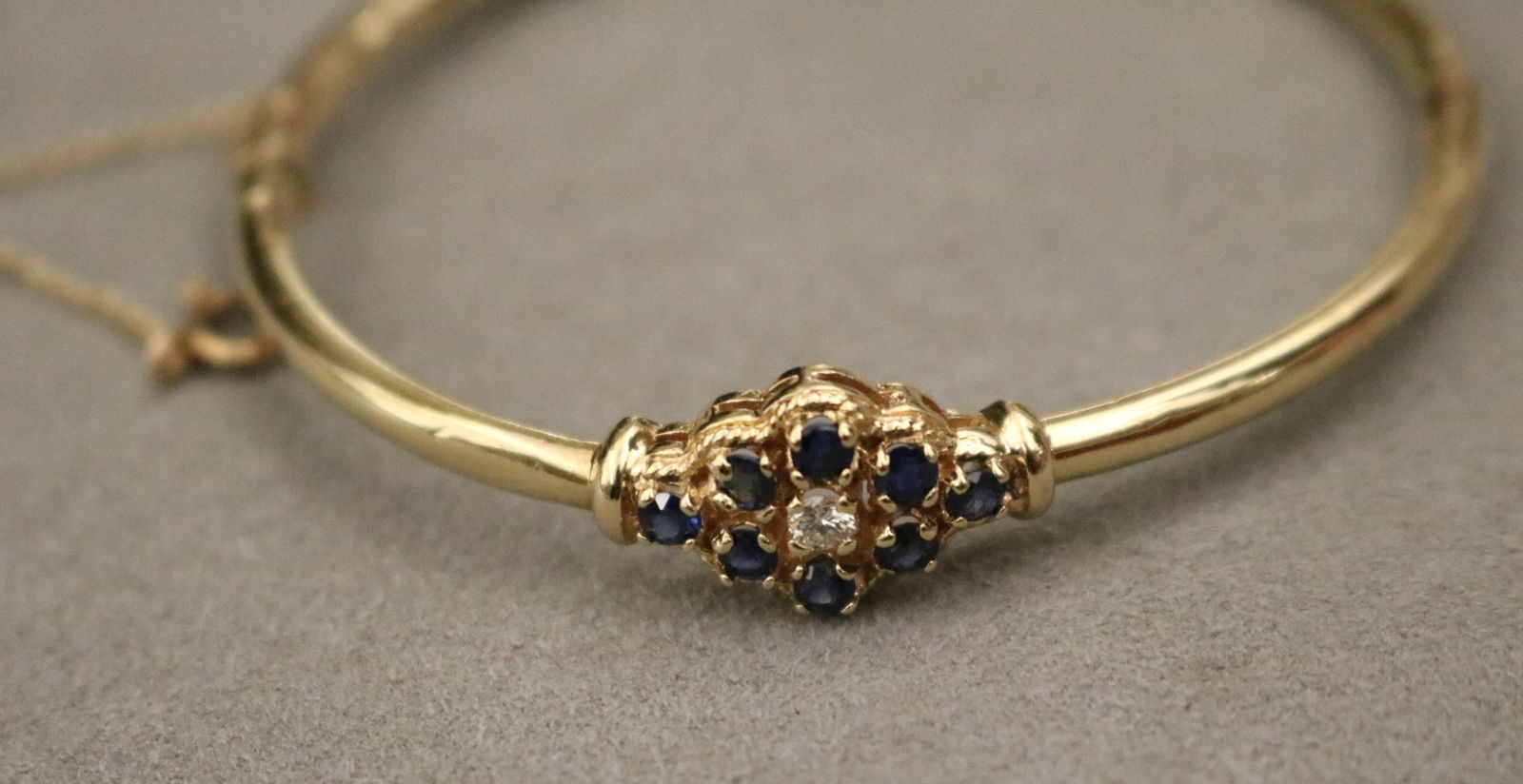 14K BRIGHT-POLISHED YELLOW GOLD, DIAMOND AND SAPPHIRE HINGED CIRCULAR BANGLE BRACELET D: 2 1/4 in. (1 of 14)
