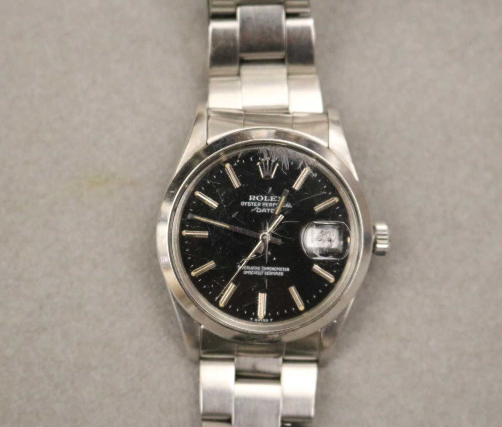 GENTLEMAN'S ROLEX STAINLESS STEEL OYSTER PERPETUAL WRISTWATCH: GENTLEMAN'S ROLEX STAINLESS STEEL OYSTER PERPETUAL WRISTWATCHBlack dial; date window.