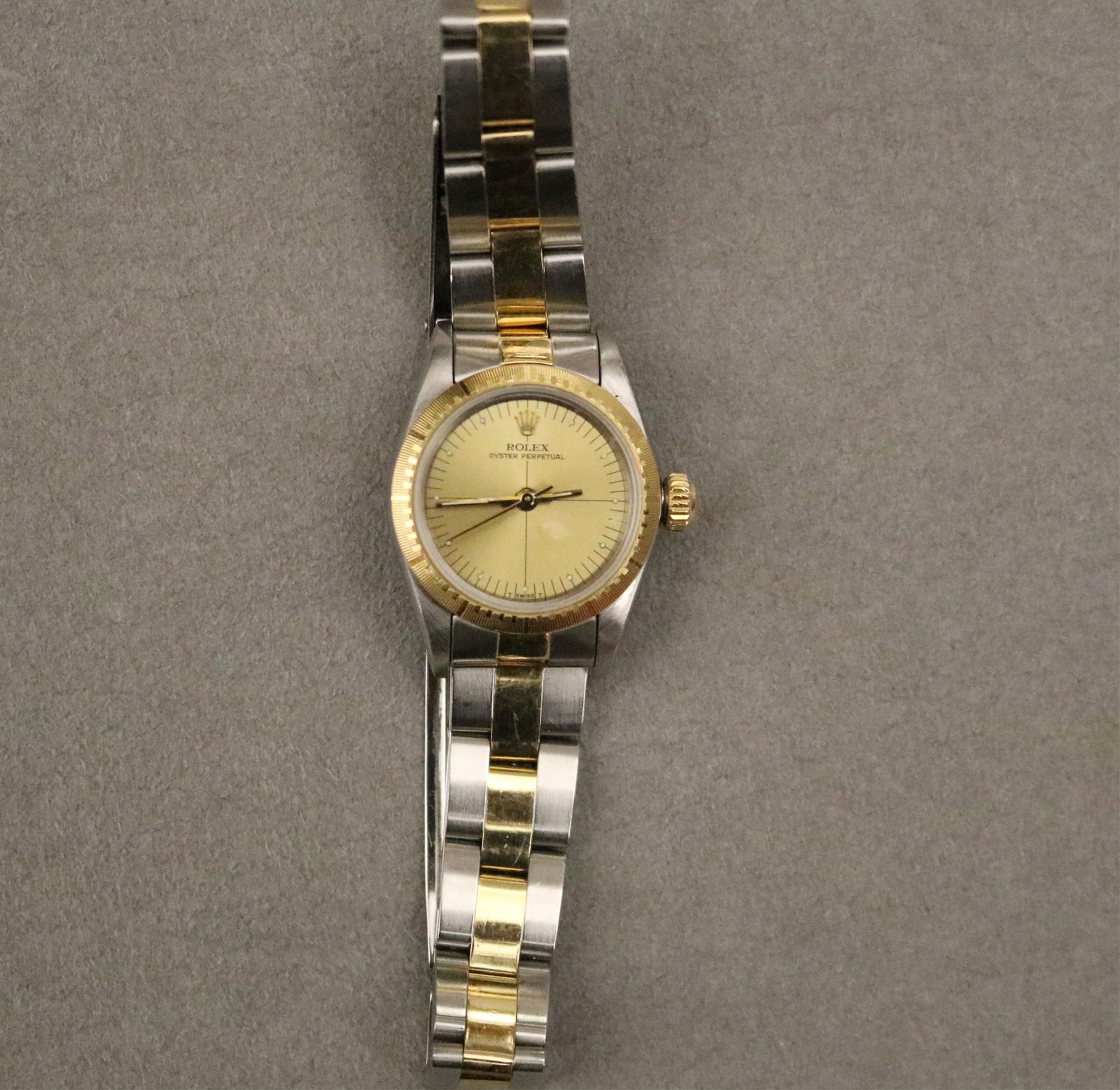 LADY'S ROLEX 14K YELLOW GOLD AND STAINLESS STEEL OYSTER PERPETUAL WRISTWATCH: LADY'S ROLEX 14K YELLOW GOLD AND STAINLESS STEEL OYSTER PERPETUAL WRISTWATCHChampagne color dial; sweep second hand