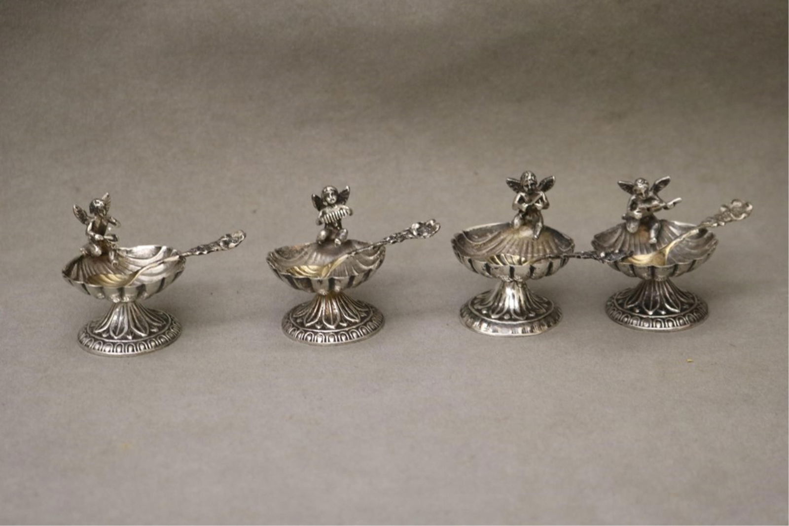 SET ELEVEN WEIGHTED STERLING SILVER INDIVIDUAL COCKLESHELL-AND-CHERUB, PEDESTAL BASE INDIVIDUAL (1 of 6)
