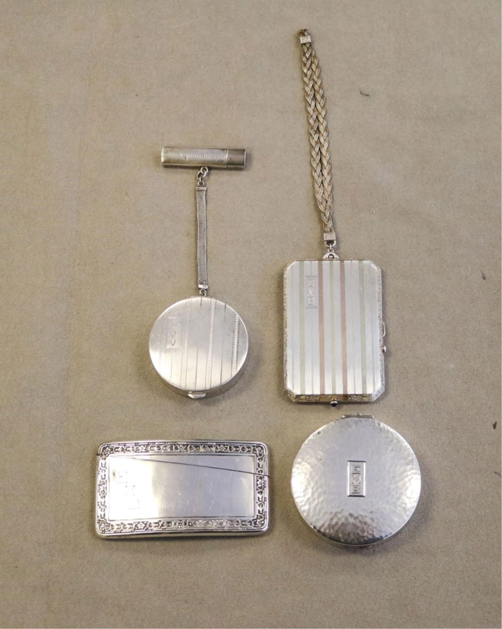 THREE ASSORTED STERLING SILVER COMPACTS AND A CARD CASE early 20th century Card case, 3 1/4 in. x 1 (1 of 11)