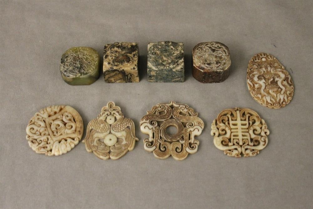 GROUP EIGHT CHINESE STONE AMULETS, CARVINGS, AND ONE MARBLE SEAL. Variously pierced and carved with (1 of 3)