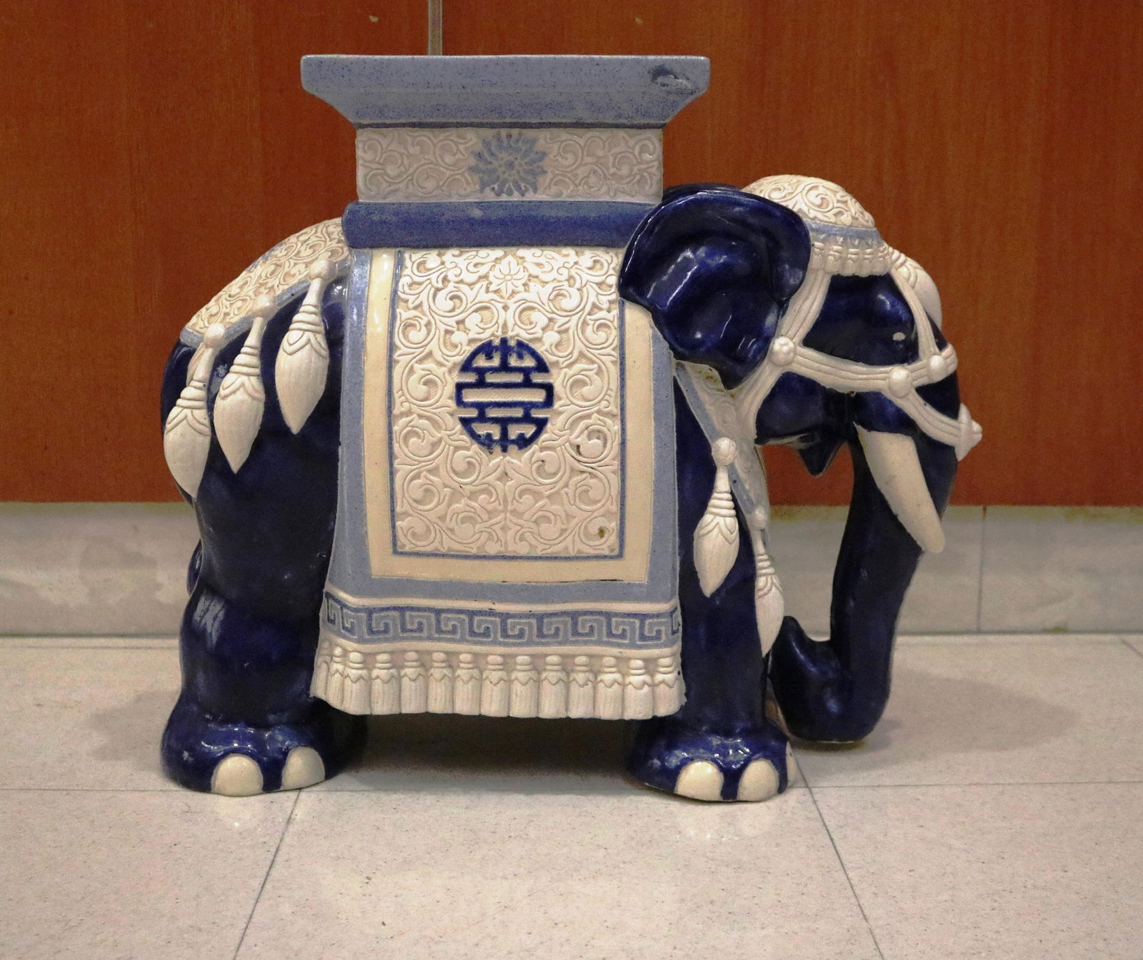 BLUE AND WHITE GLAZED CERAMIC ELEPHANT STAND H: 16 1/2 in. L: 19 in. (1 of 6)