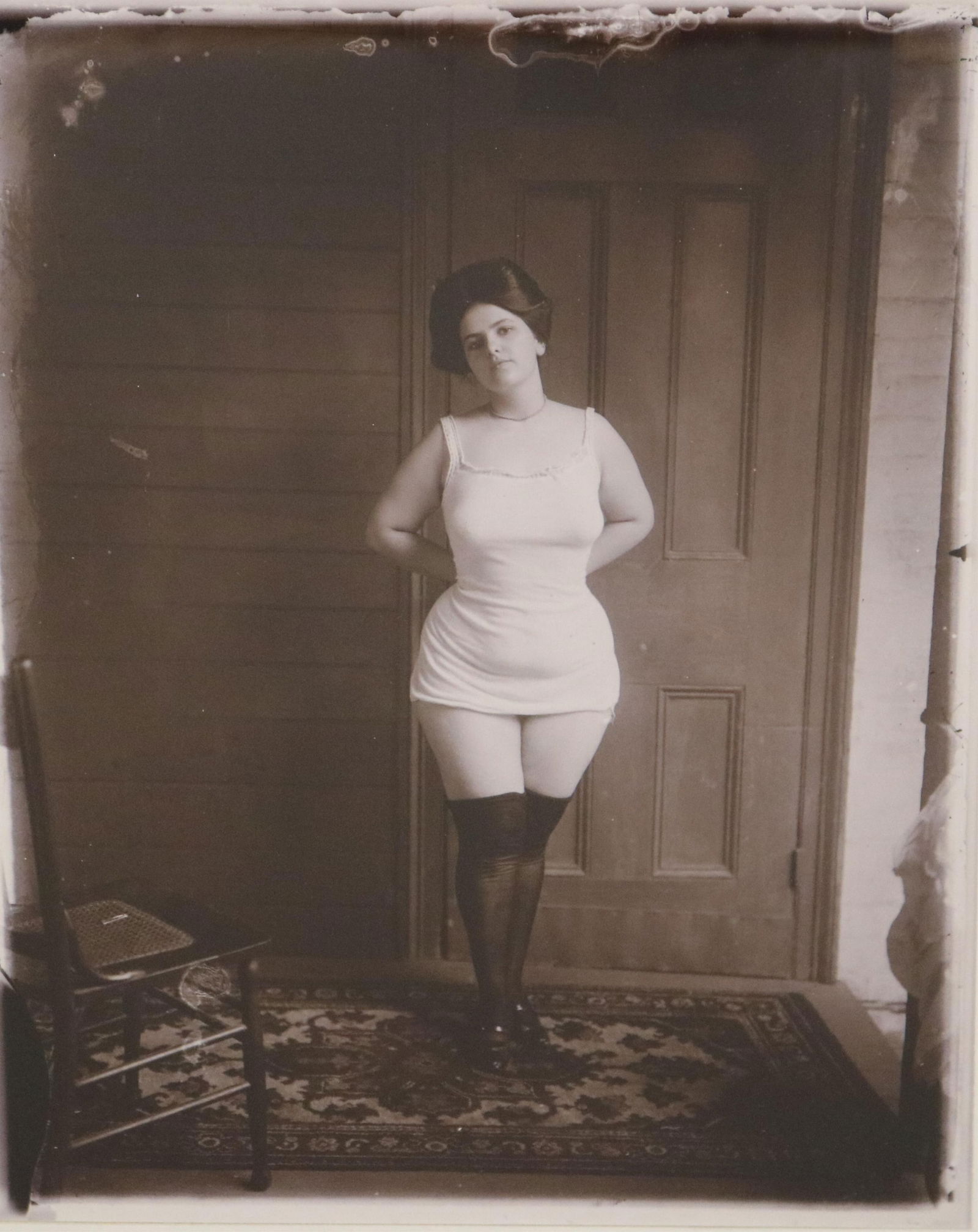 E. J. Bellocq, American 1873 – 1949, Woman standing in her underwear; Storyville Portrait, New: E. J. BELLOCQAmerican, 1873 – 1949Woman standing in her underwear; Storyville Portrait, New Orleans, 1911-13; printed 1970s by Lee FriedlanderGold-toned gelatin silver print first taken in the early