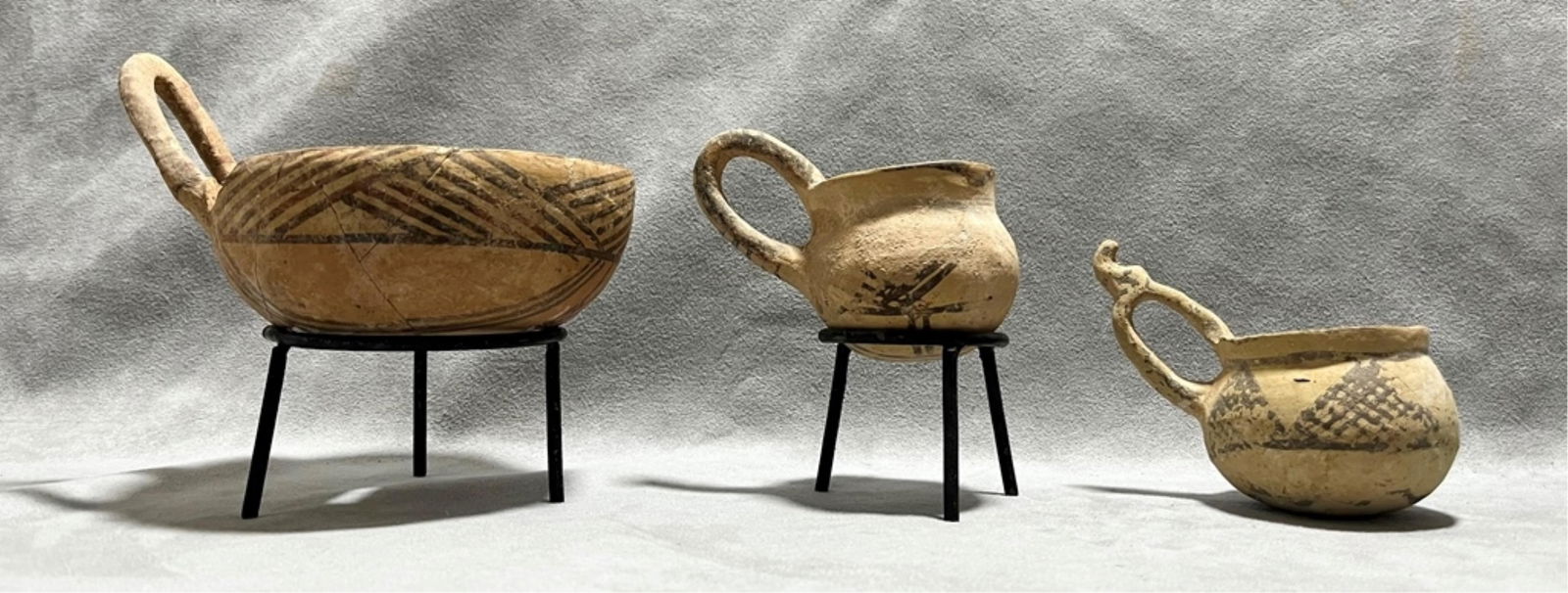 Three Ancient Cypriot Decorated "Milk Bowls", height: 3 to 4 inches; diameter: (approx.) 6 inches: Three Ancient Cypriot Decorated "Milk Bowls"Set of three ancient repaired pottery from Cyprus characteristics of White Painted and Bichrome Ware from the Cypro-Geometric period (c. 1050–750 BCE). Th