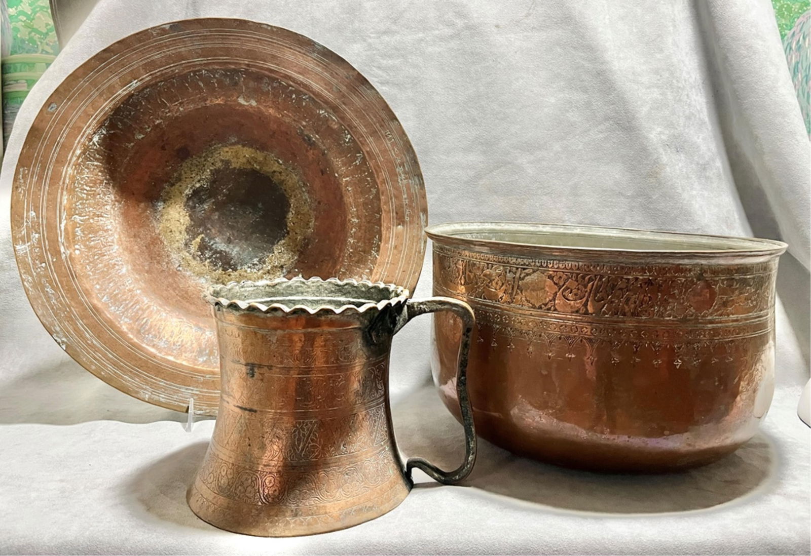 Islamic Copperware: A bowl, basin, and pot, Diameter: 17 inches (largest object: the basin) (1 of 17)