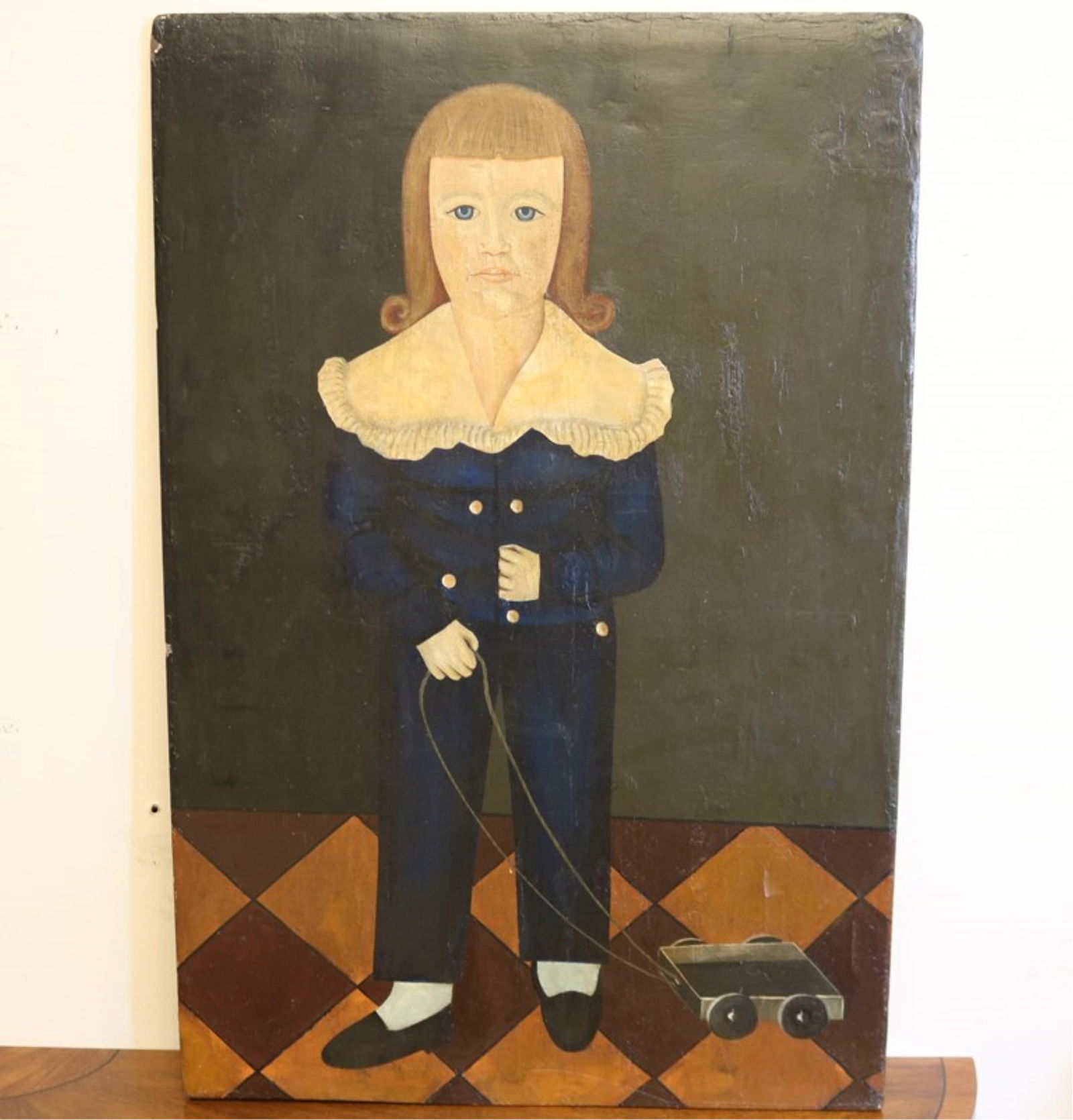 John Brewster Jr. (AFTER), American 19th century, Boy with Toy: JOHN BREWSTER JR. (AFTER)American, 19th centuryBoy with Toy20th century artwork. Mixed media on a wooden board. Verso title. Unsigned. Unframed. 19.5 x 29 inches