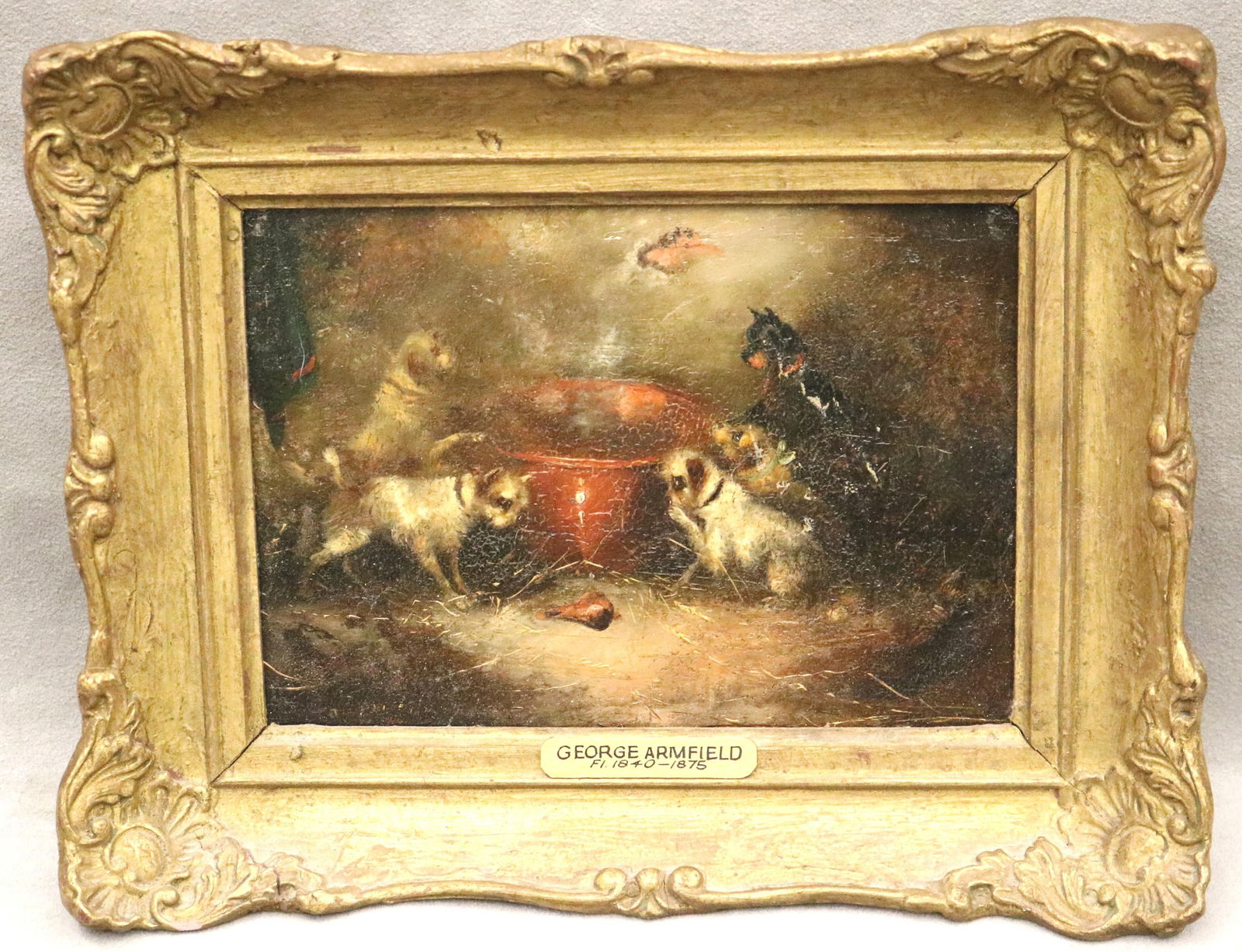 George Armfield (Attributed), English 1810–1893, Hot Breakfast, Oil on board, Artwork: 5 x 7: GEORGE ARMFIELD (ATTRIBUTED)English, 1810–1893Hot BreakfastOil on boardCharming domestic scene where a group of terriers is gathered around a glowing red cooking pot, likely awaiting a meal. Verso t