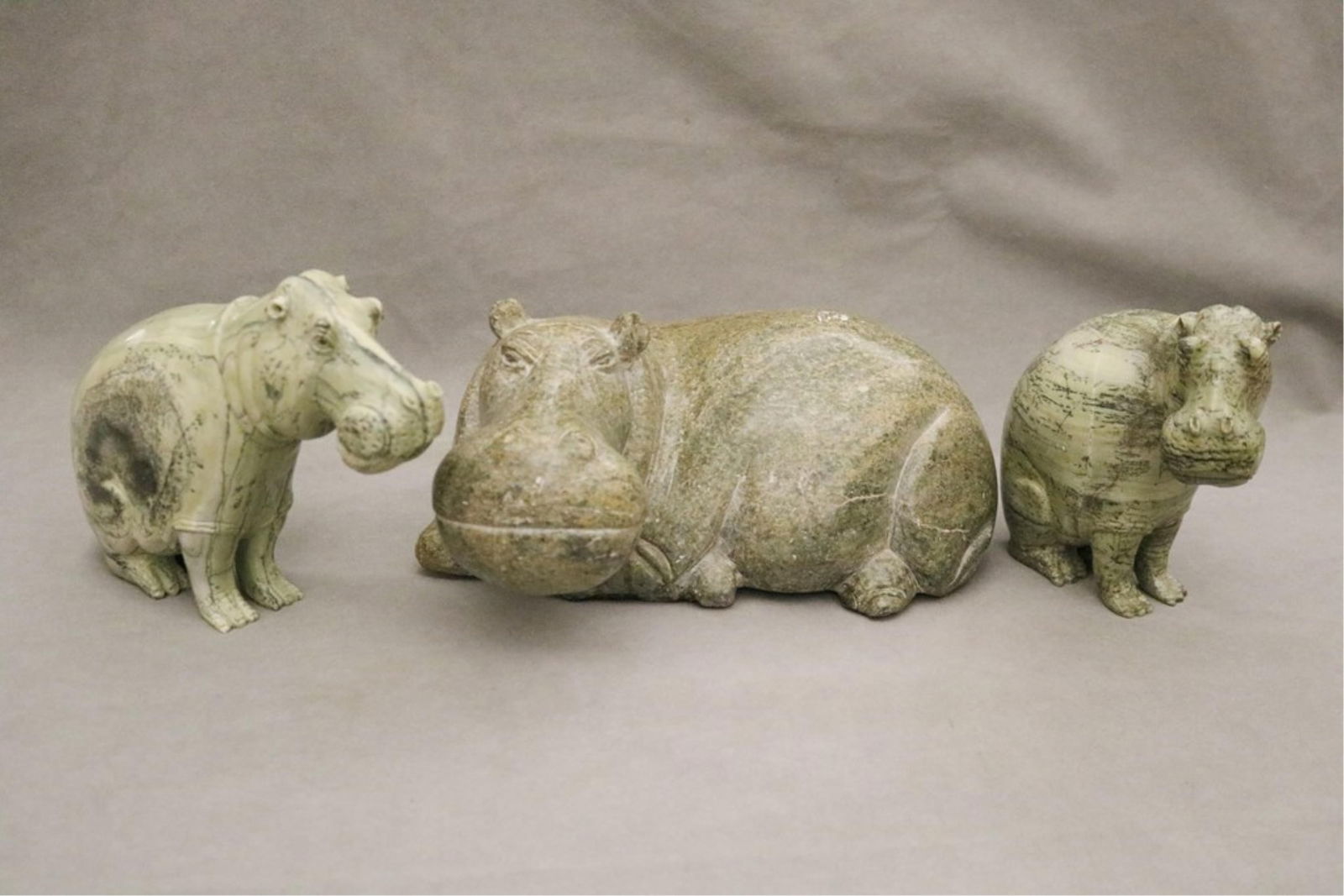 CARVED GRAY HARDSTONE FIGURE OF RECLINING HIPPOPOTAMUS. - H: 5 3/4 in. L: 13 in. (1 of 5)