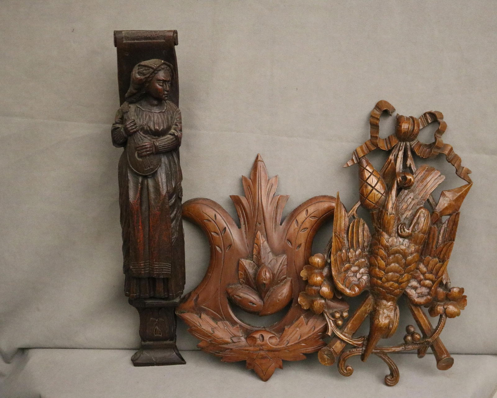 THREE ASSORTED CARVED WOOD WALL ORNAMENTS - . (1 of 7)