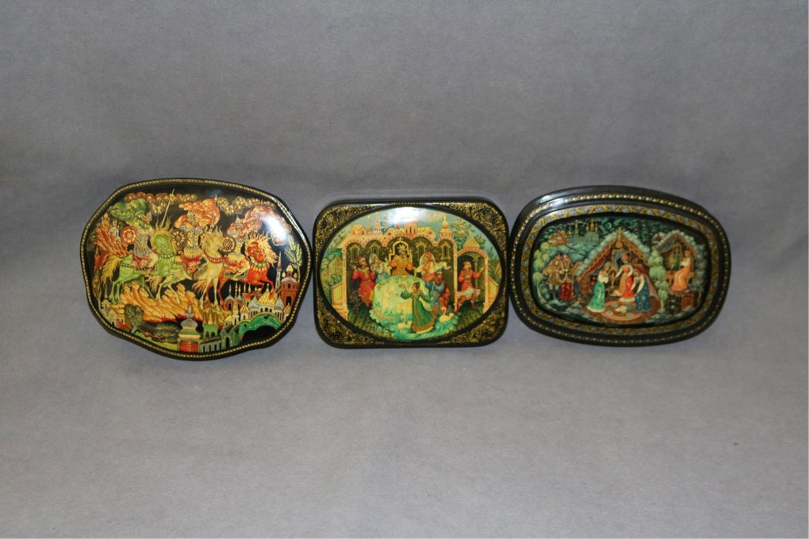 THREE RUSSIAN HAND-PAINTED, BLACK LACQUERED FAIRY BOXES. - . (1 of 7)